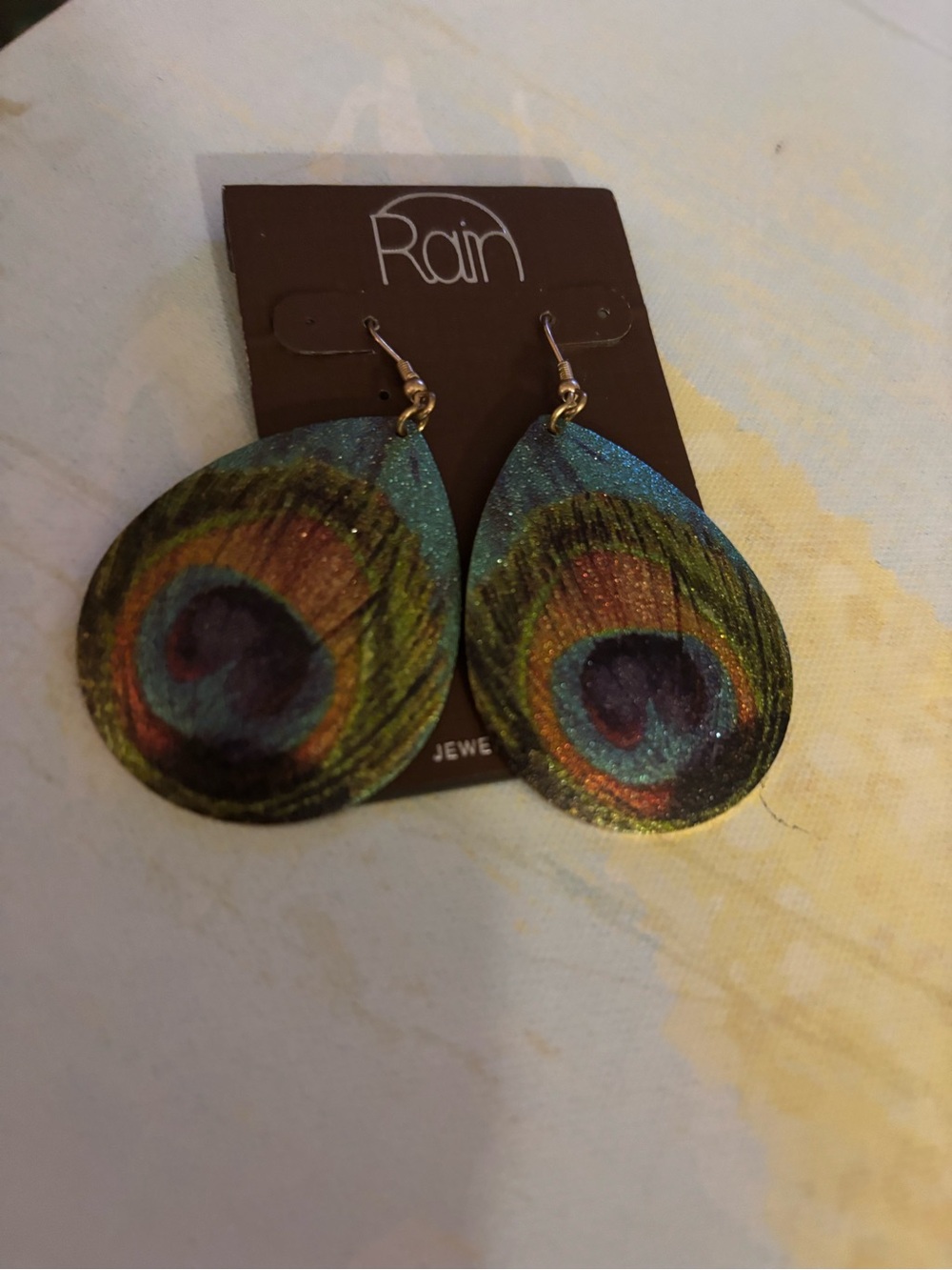 Peacock painted earrings by Rain. 2 inches long gold-tone look backings $9.00 - Picture 4 of 4